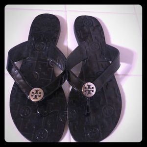 Black patent Tory Burch sandals with silver logo